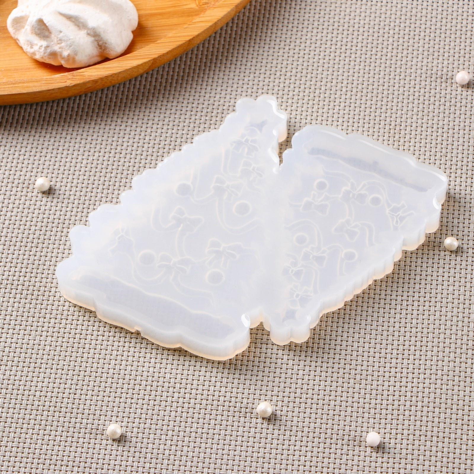 Силиконовая форма «Ёлка с бантиками», 12×10 см, цвет прозрачный