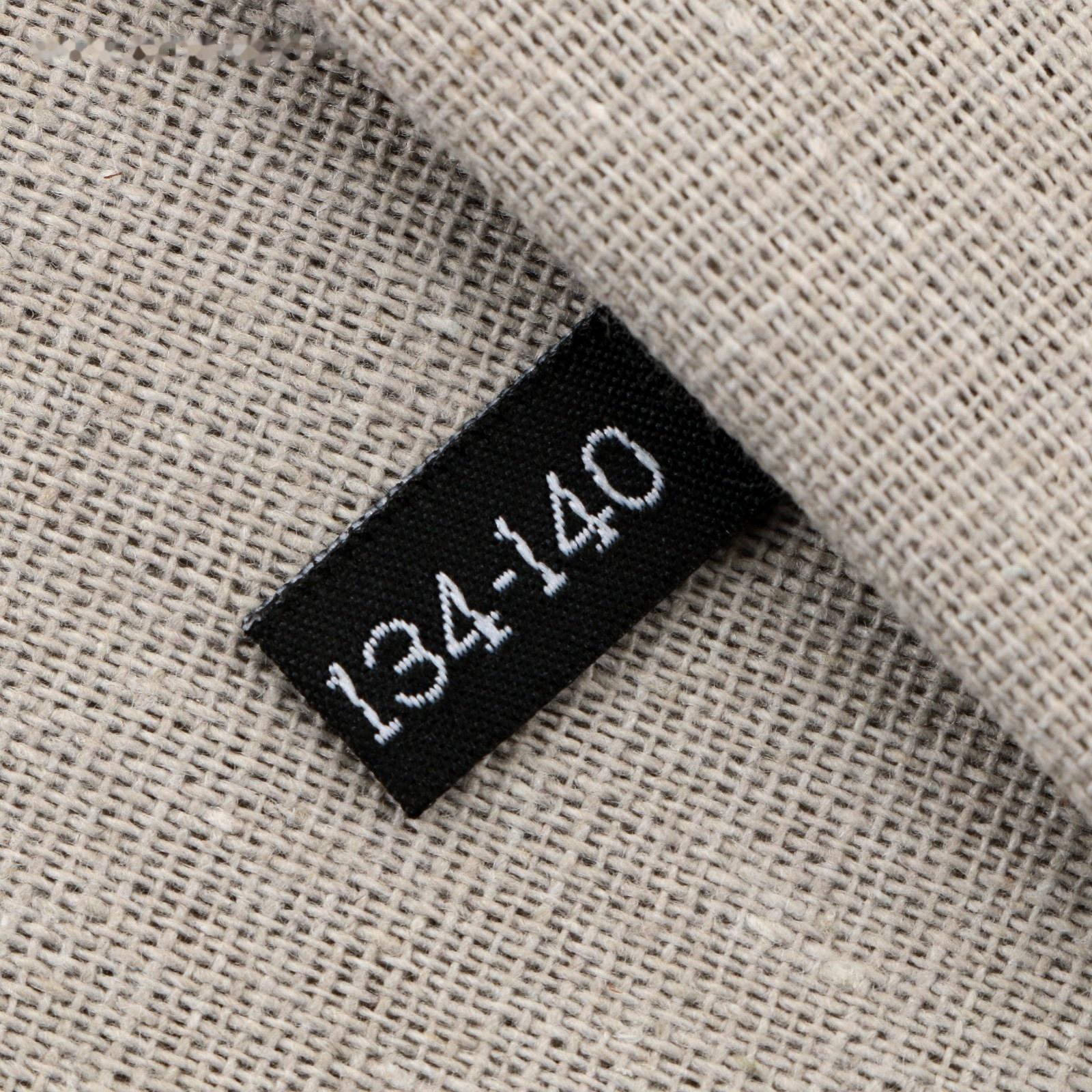 Нашивка текстильная «134-140», 5 х 1.1 см, цвет чёрный