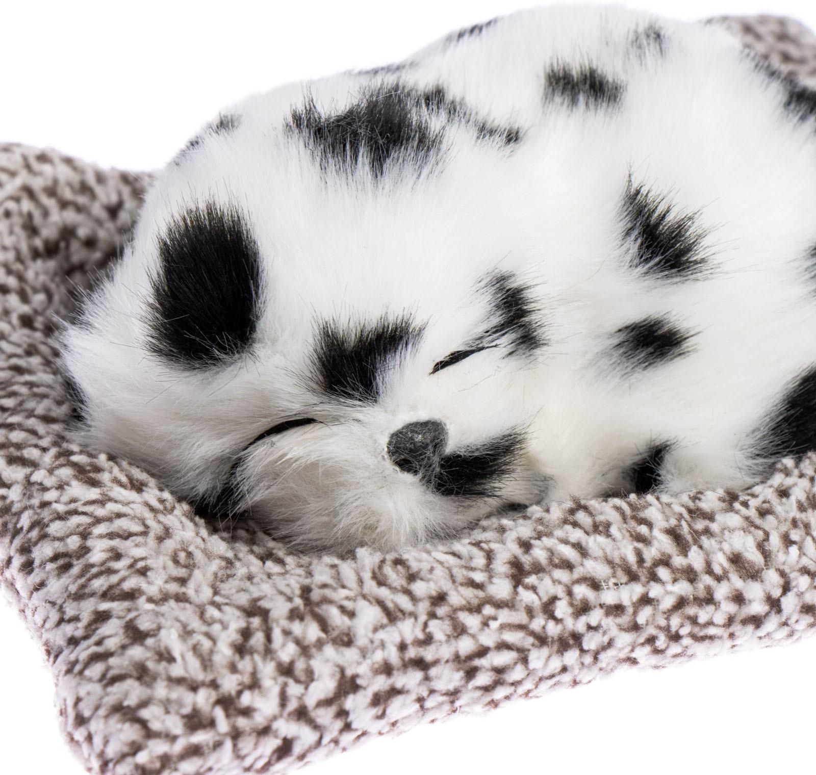 Игрушка на панель авто, собака на подушке, бело-черный окрас