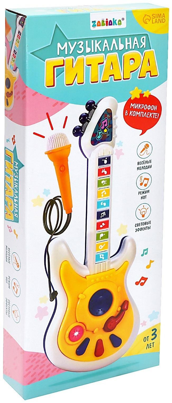 Музыкальная гитара, звук, свет