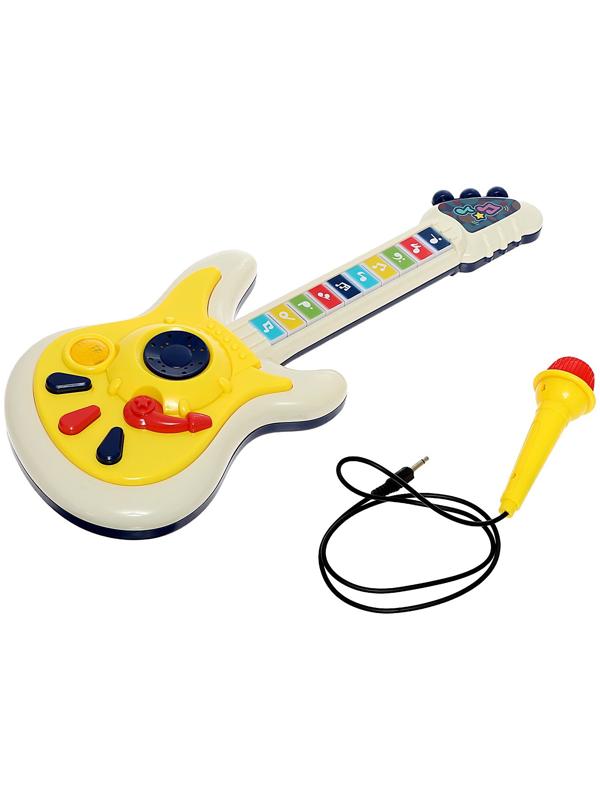 Музыкальная гитара, звук, свет