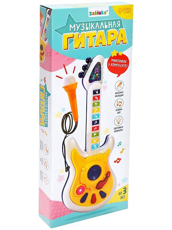 Музыкальная гитара, звук, свет