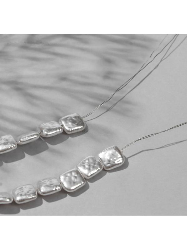 Бусины пластиковые на нити 