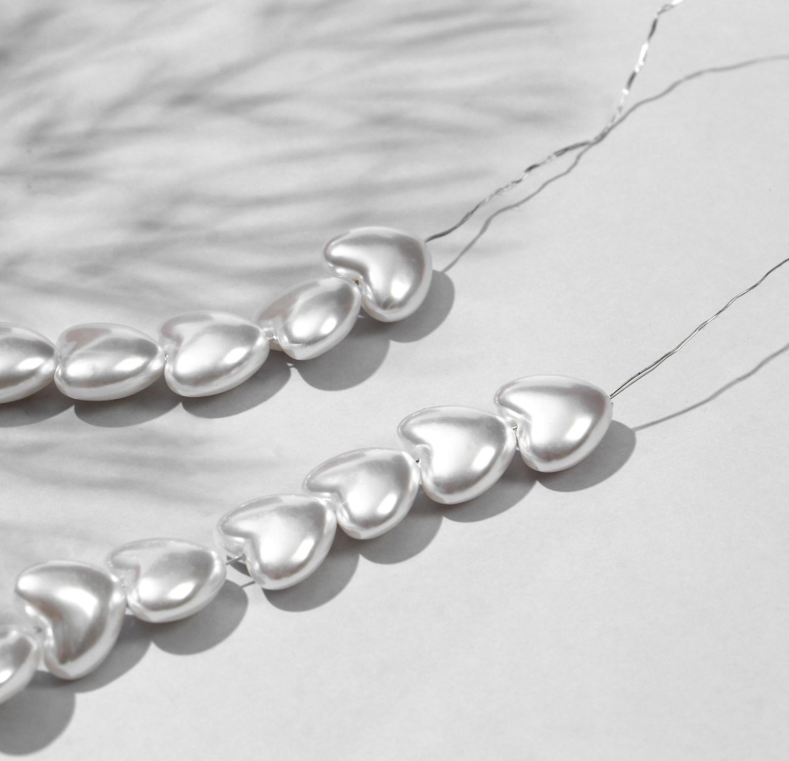 Бусины пластиковые на нити 