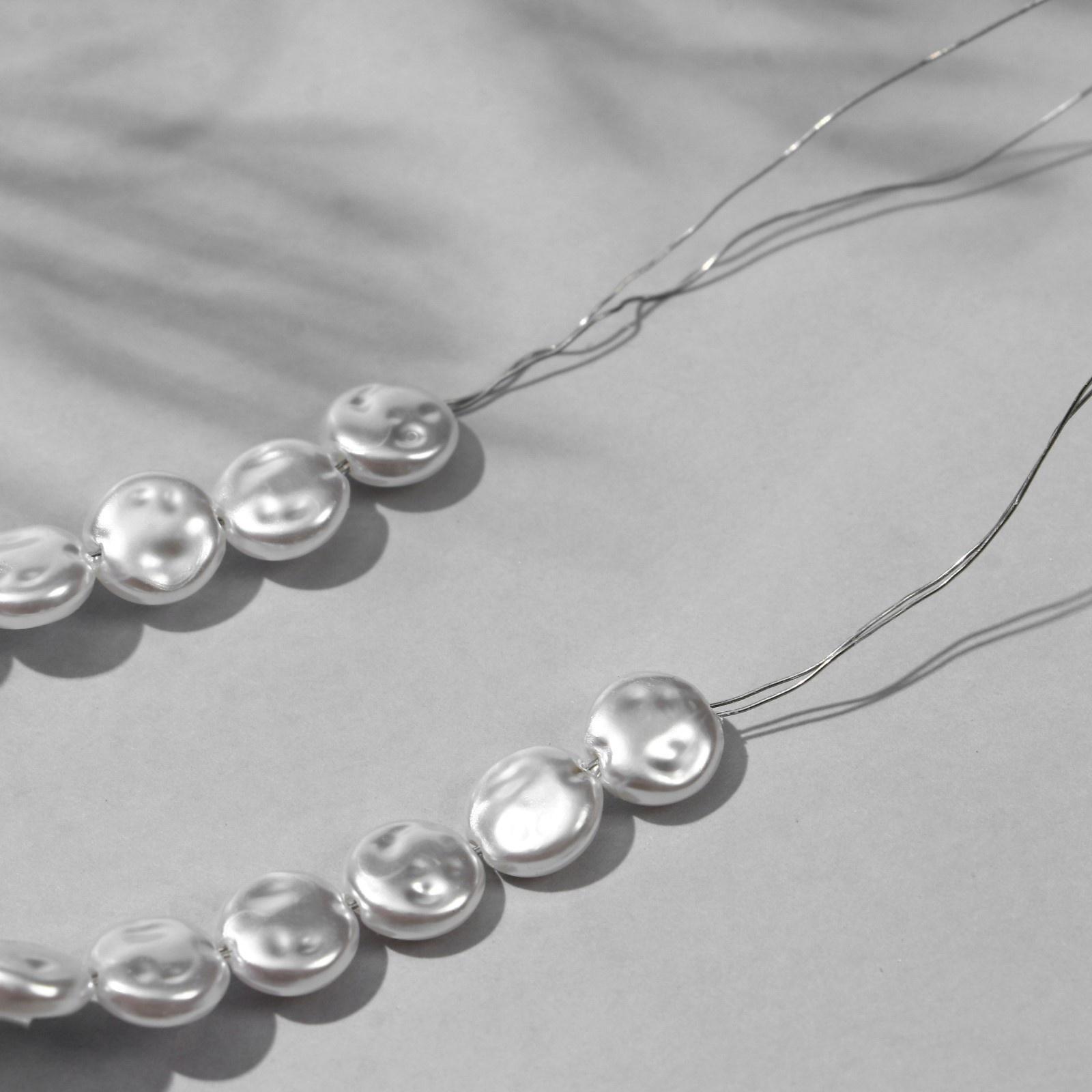 Бусины пластиковые на нити 