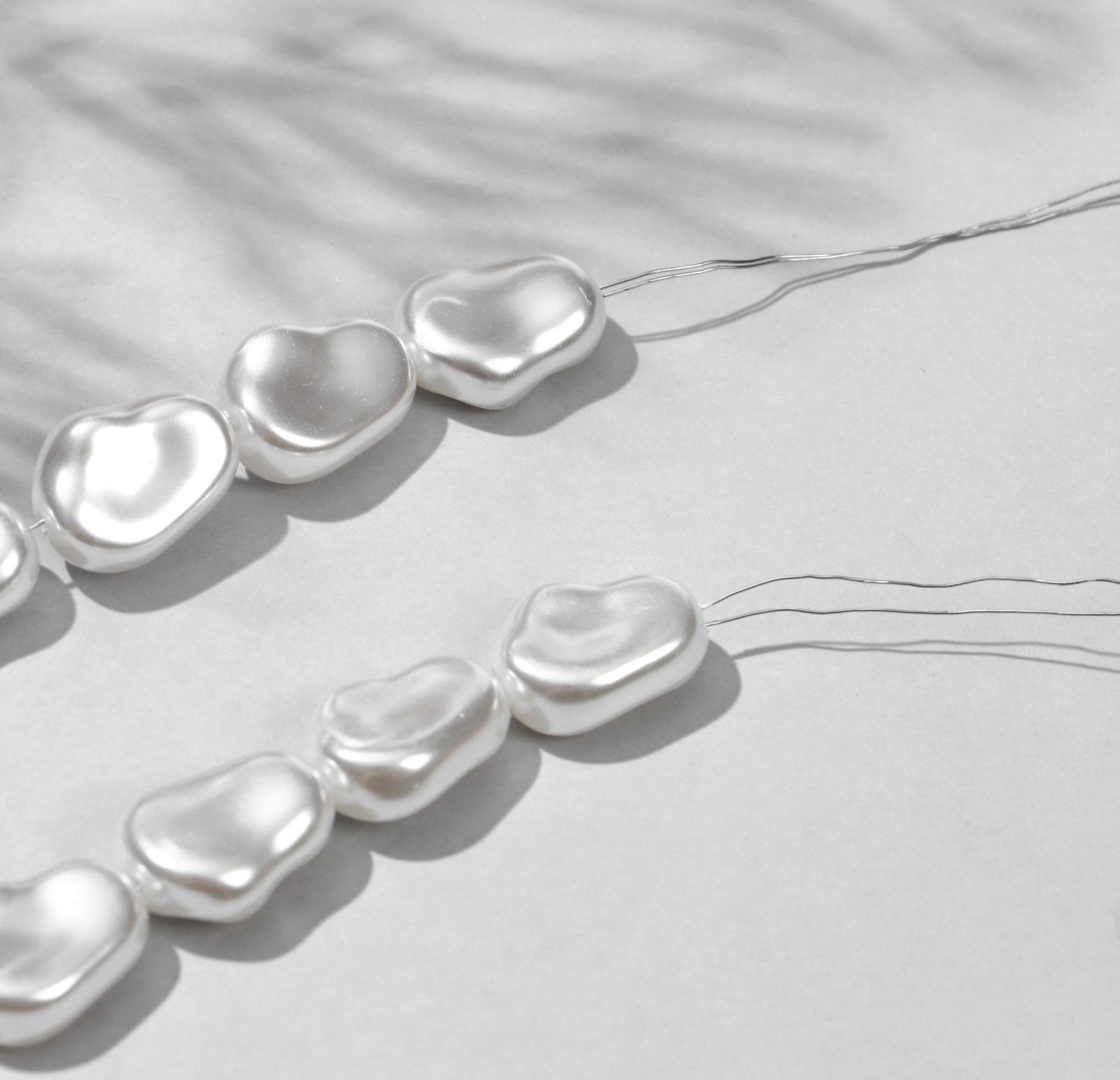 Бусины пластиковые на нити 