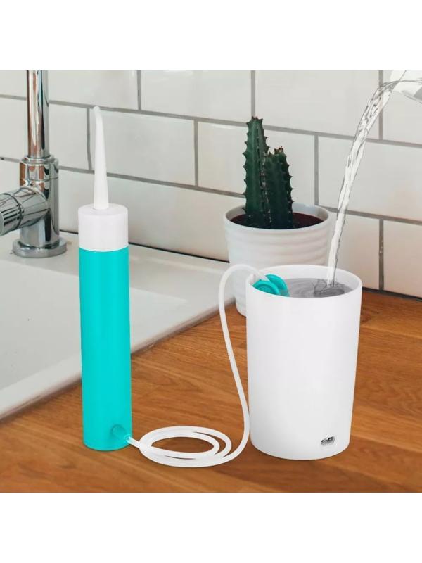 Ирригатор Kitfort КТ-2957-3, портативный, 320 мл, 3 режима, 2 насадки, от АКБ, бело-голубой