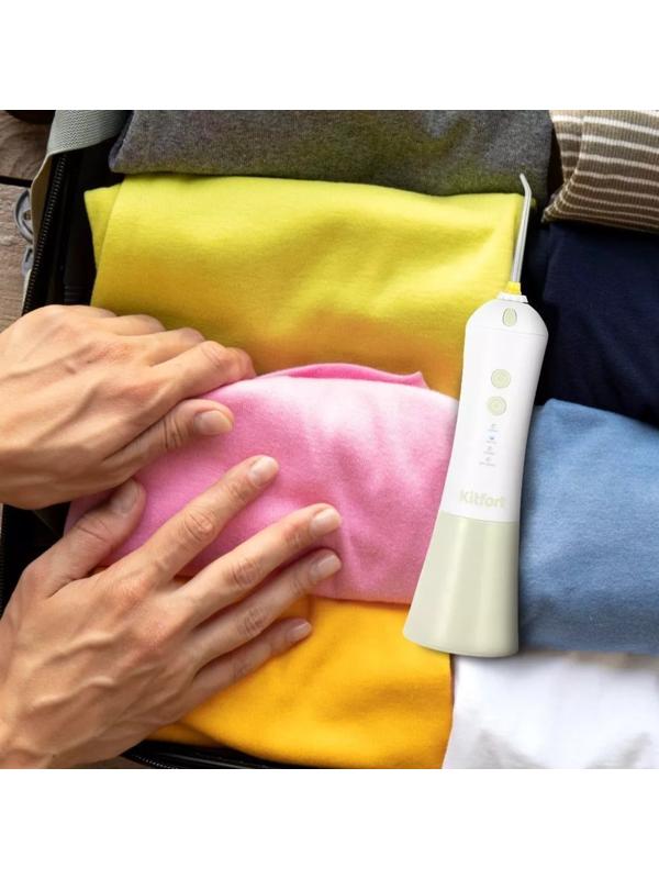 Ирригатор Kitfort КТ-2958-2, портативный, 200 мл, 4 режима, 3 насадки, от АКБ, бело-бежевый