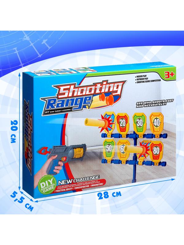 Пистолет с мишенью, стреляет присосками и мячиками