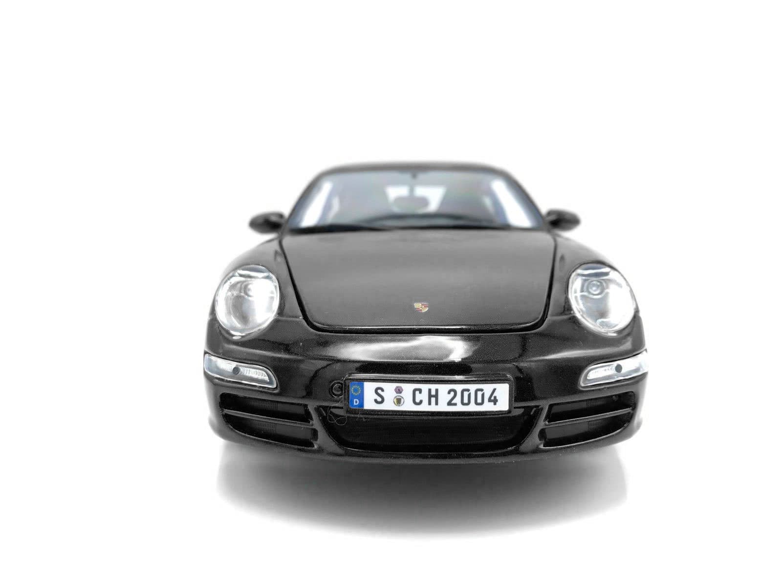 Металлическая машинка Maisto 1:18 «Porsche 911 Carrera S» 31692 / Черный