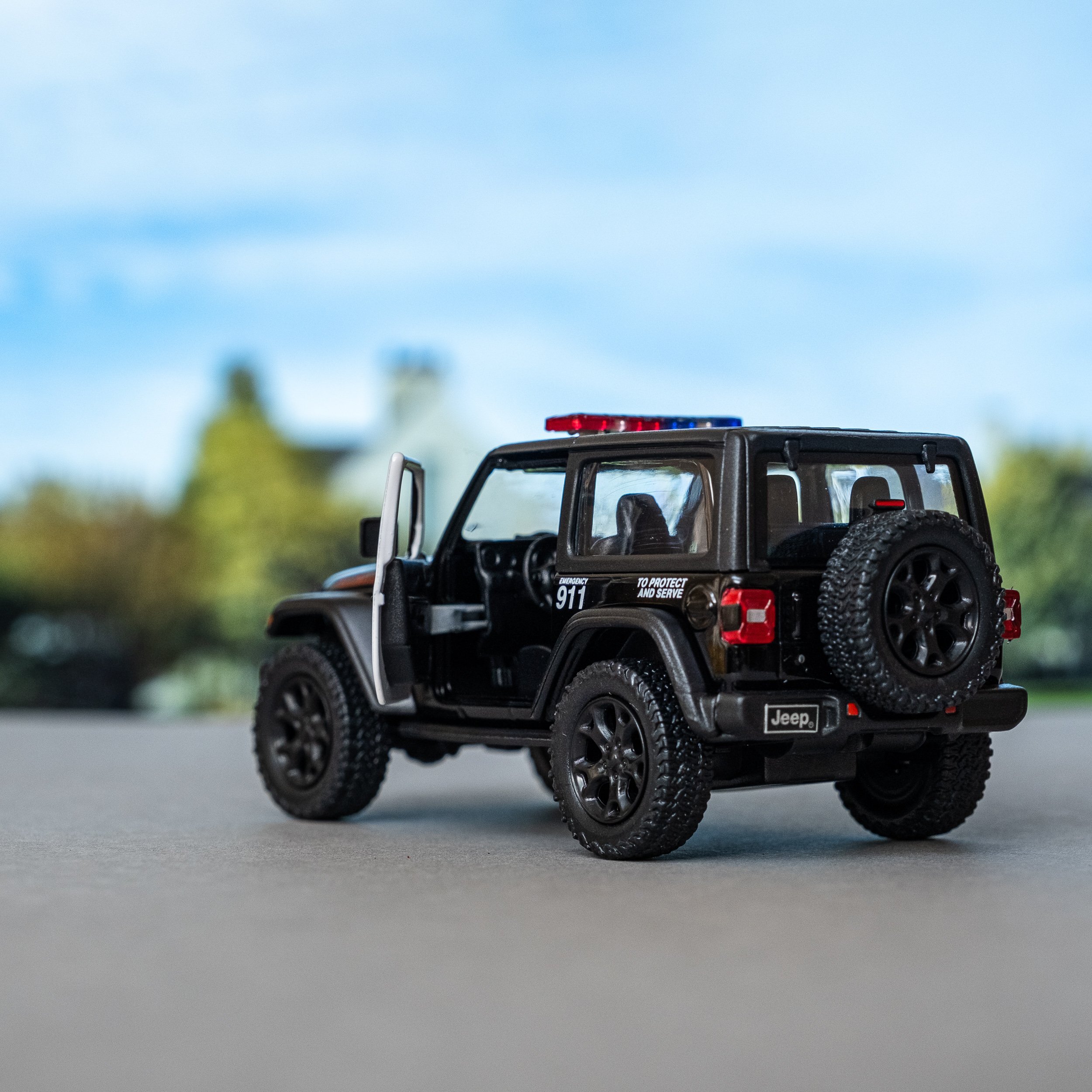 Металлическая машинка Kinsmart 1:34 «2018 Jeep Wrangler (Police)» KT5412DP, инерционная