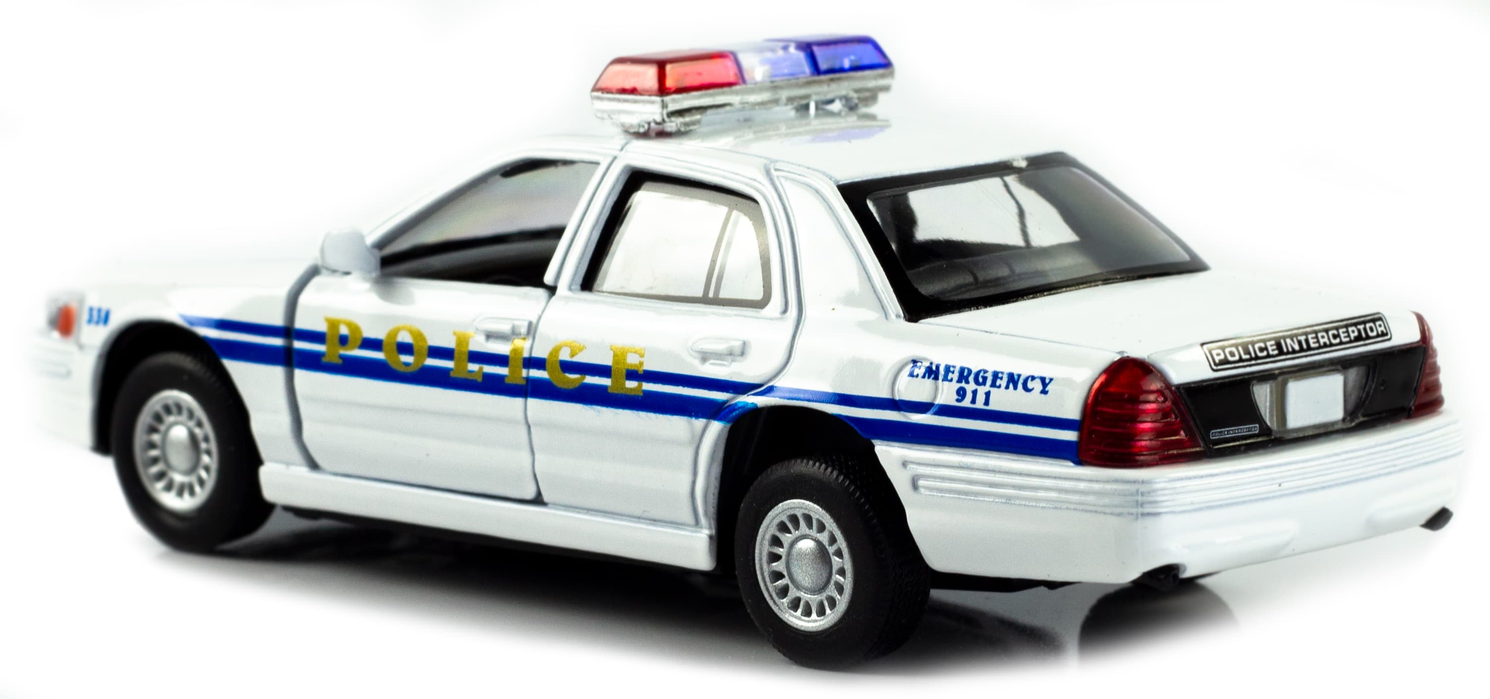 Металлическая машинка Kinsmart 1:42 «Ford Crown Victoria Police Interceptor» KT5342D инерционная / Белая