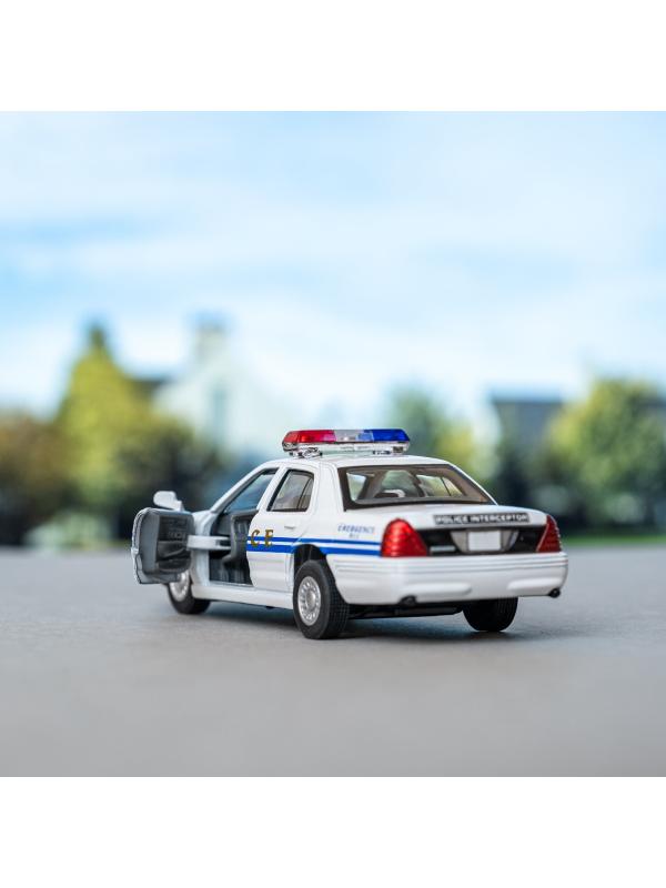 Металлическая машинка Kinsmart 1:42 «Ford Crown Victoria Police Interceptor» KT5342D инерционная / Белая