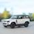 Металлическая машинка Kinsmart 1:36 «Land Rover Defender 90» KT5428D, инерционная / Белый