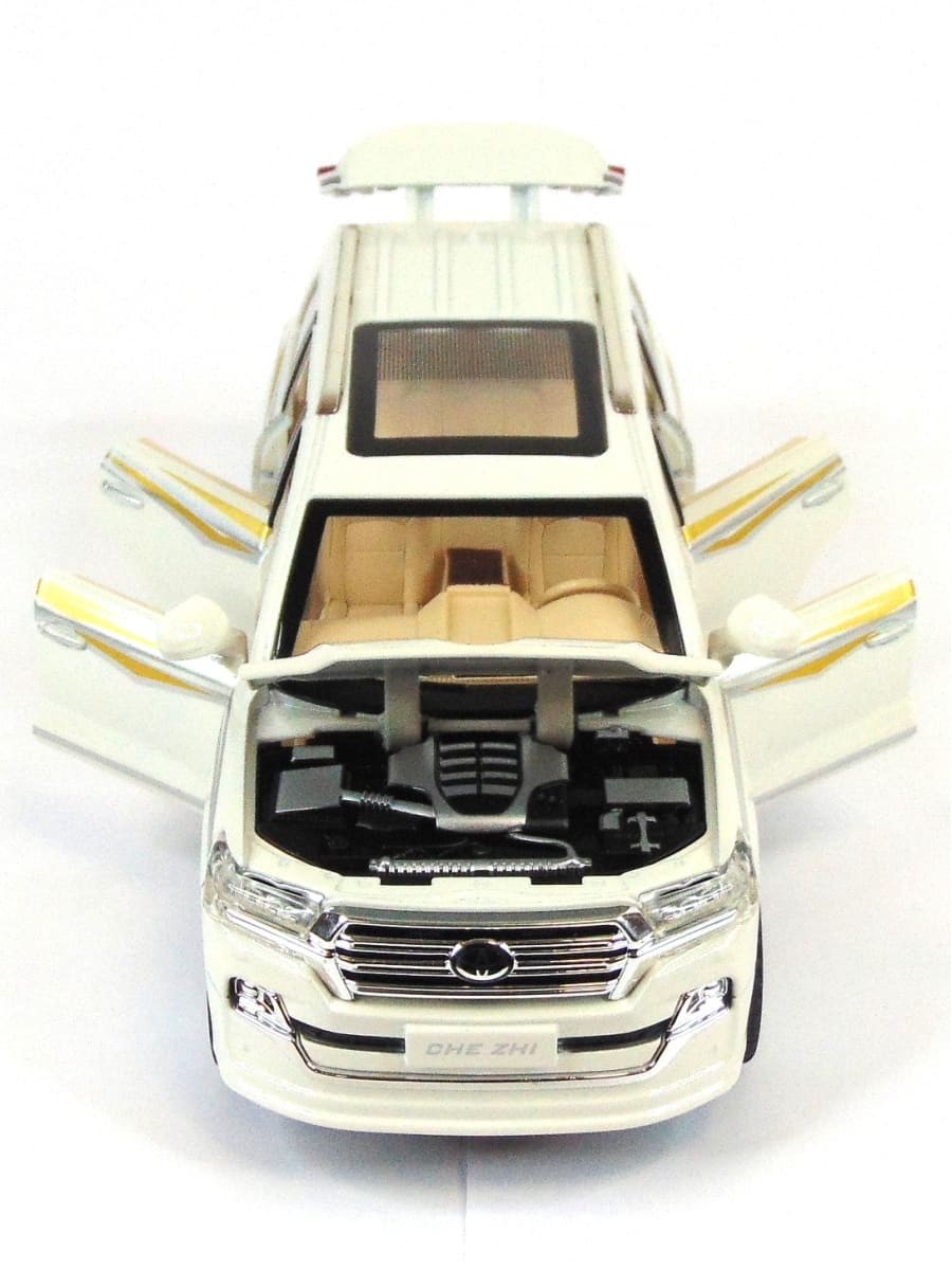 Металлическая машинка Che Zhi 1:24 «Toyota Land Cruiser 200» CZ123A, 20.2 см., инерционная, свет, звук / Микс
