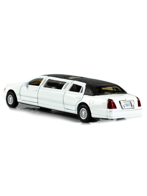 Металлическая машинка Kinsmart 1:38 «1999 Lincoln Town Car Stretch Limousine» KT7001DH / Белый