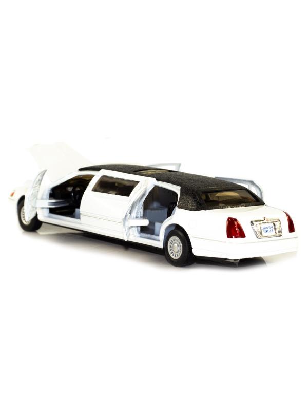 Металлическая машинка Kinsmart 1:38 «1999 Lincoln Town Car Stretch Limousine» KT7001DH / Белый