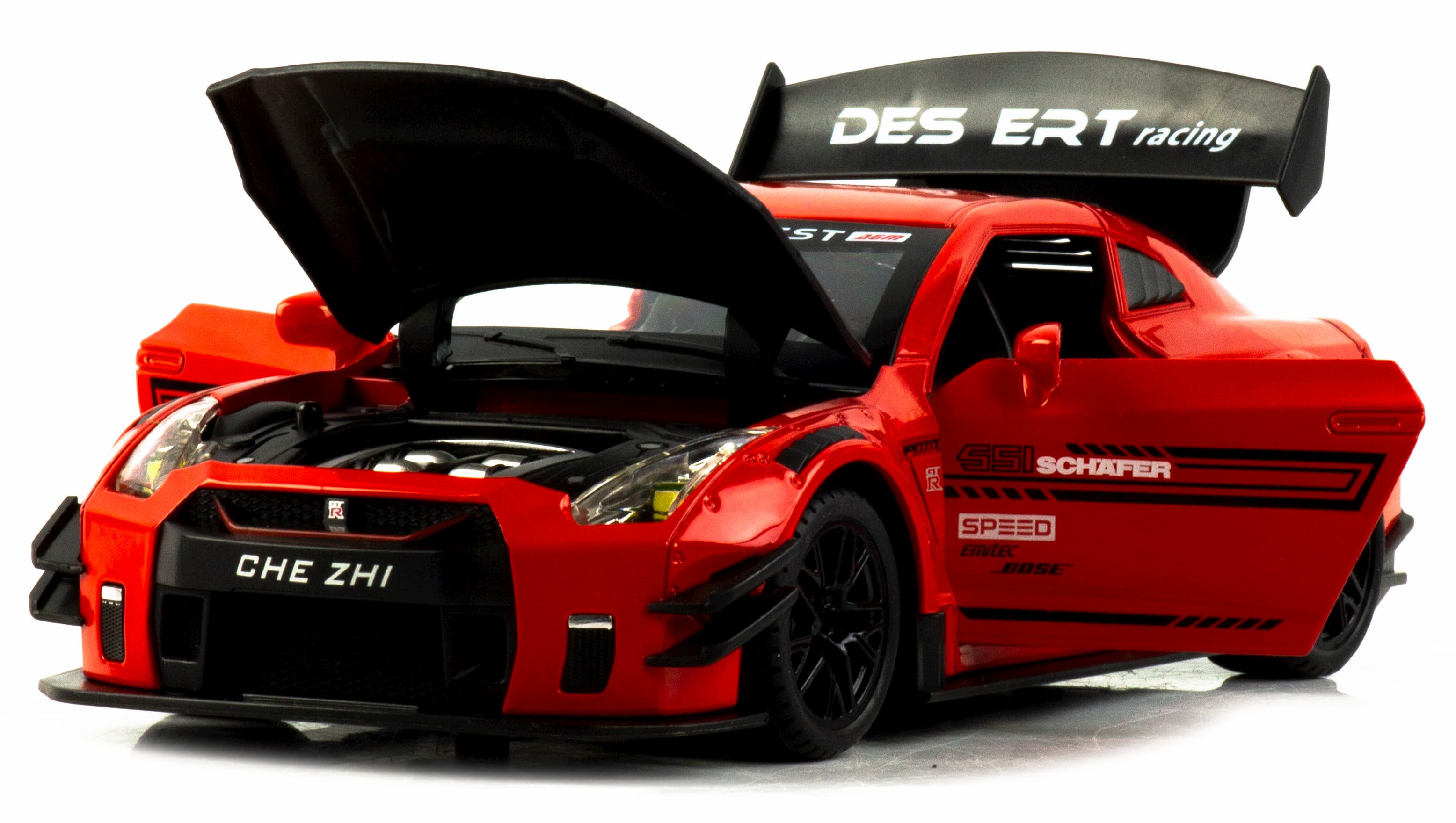 Металлическая машинка Che Zhi 1:24 «Nissan GT-R Nismo» CZ128B, 20.8 см., инерционная, свет, звук в коробке / Микс