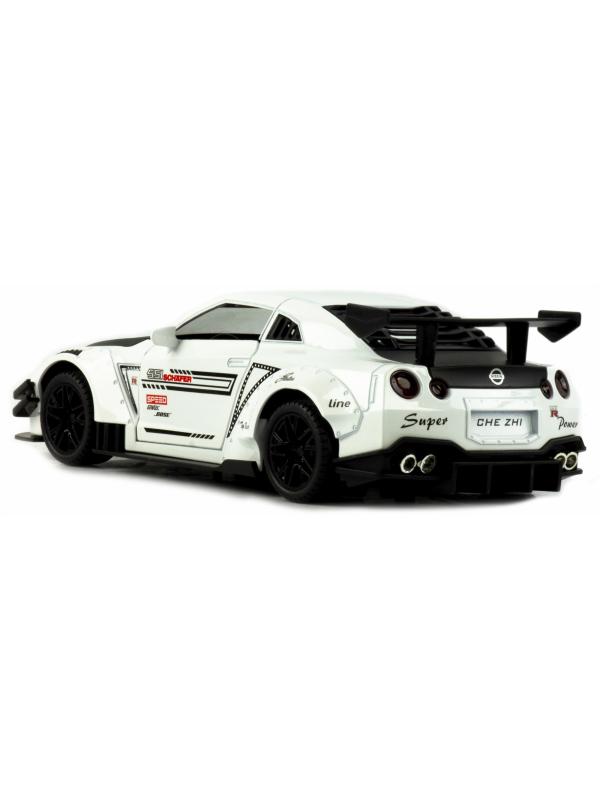 Металлическая машинка Che Zhi 1:24 «Nissan GT-R Nismo» CZ128B, 20.8 см., инерционная, свет, звук в коробке / Микс