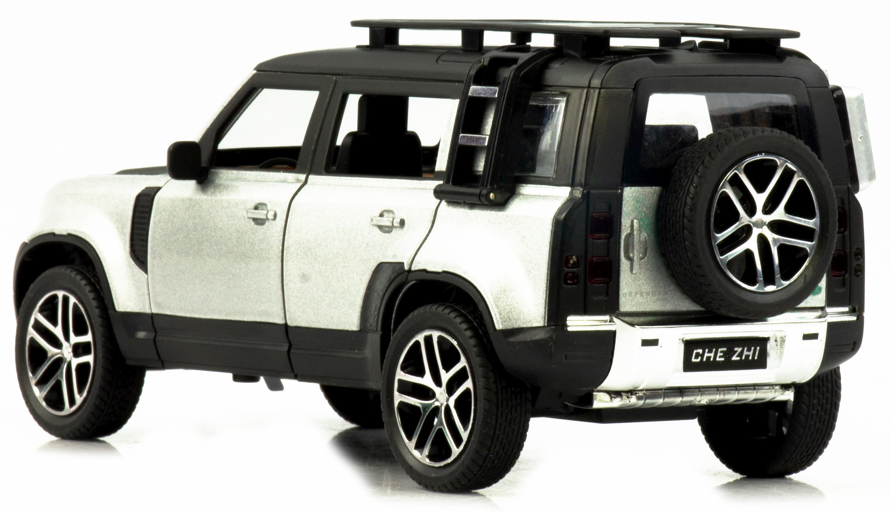 Металлическая машинка Che Zhi 1:24 «Land Rover Defender Wilderness» CZ132A, 21 см., инерционная, свет, звук / Серебристый