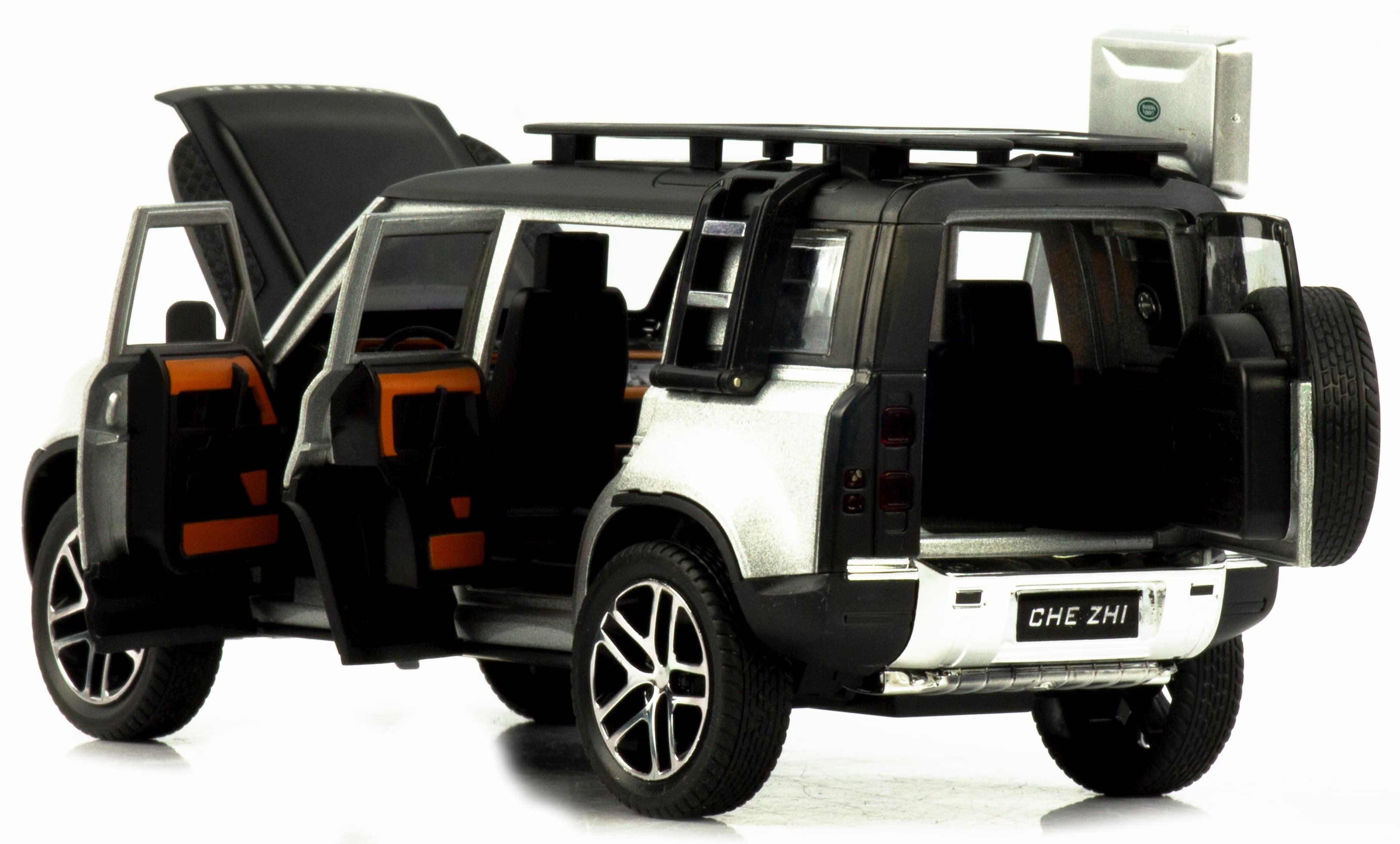 Металлическая машинка Che Zhi 1:24 «Land Rover Defender Wilderness» CZ132A, 21 см., инерционная, свет, звук / Серебристый