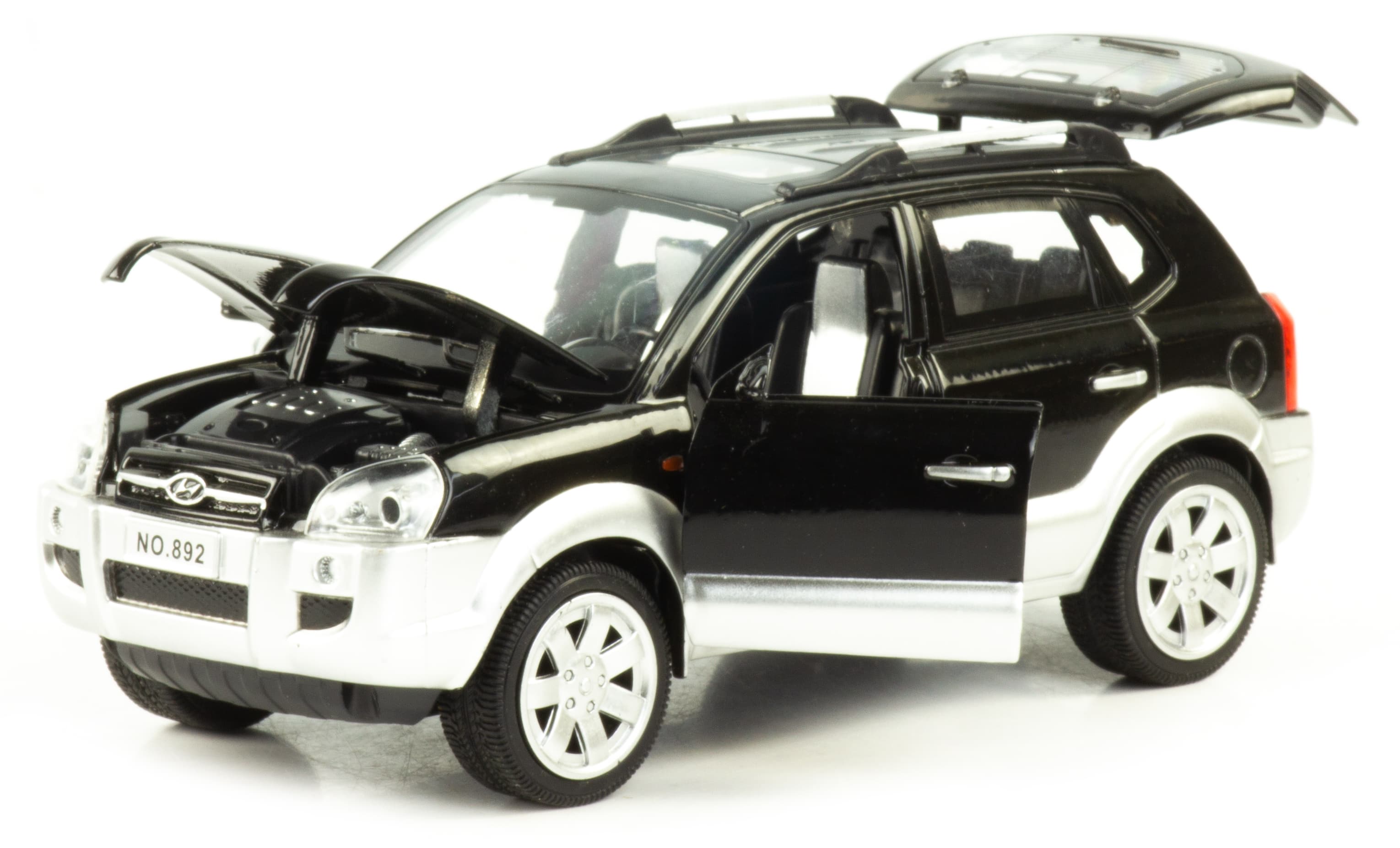 Металлическая машинка Wanbao 1:24 «Hyundai Tucson» 18 см. 892D инерционная, свет, звук / Черный