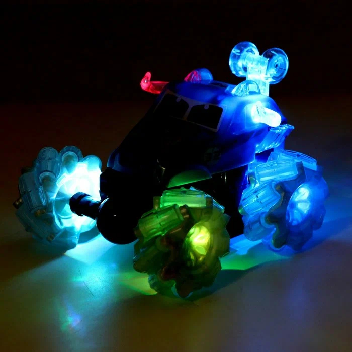 Радиоуправляемая трюковая машинка - перевертыш «Ultimate Stunt Car» 999G-52CS, колеса светятся, музыка, вращение 360, на пульте управления / Оранжевый