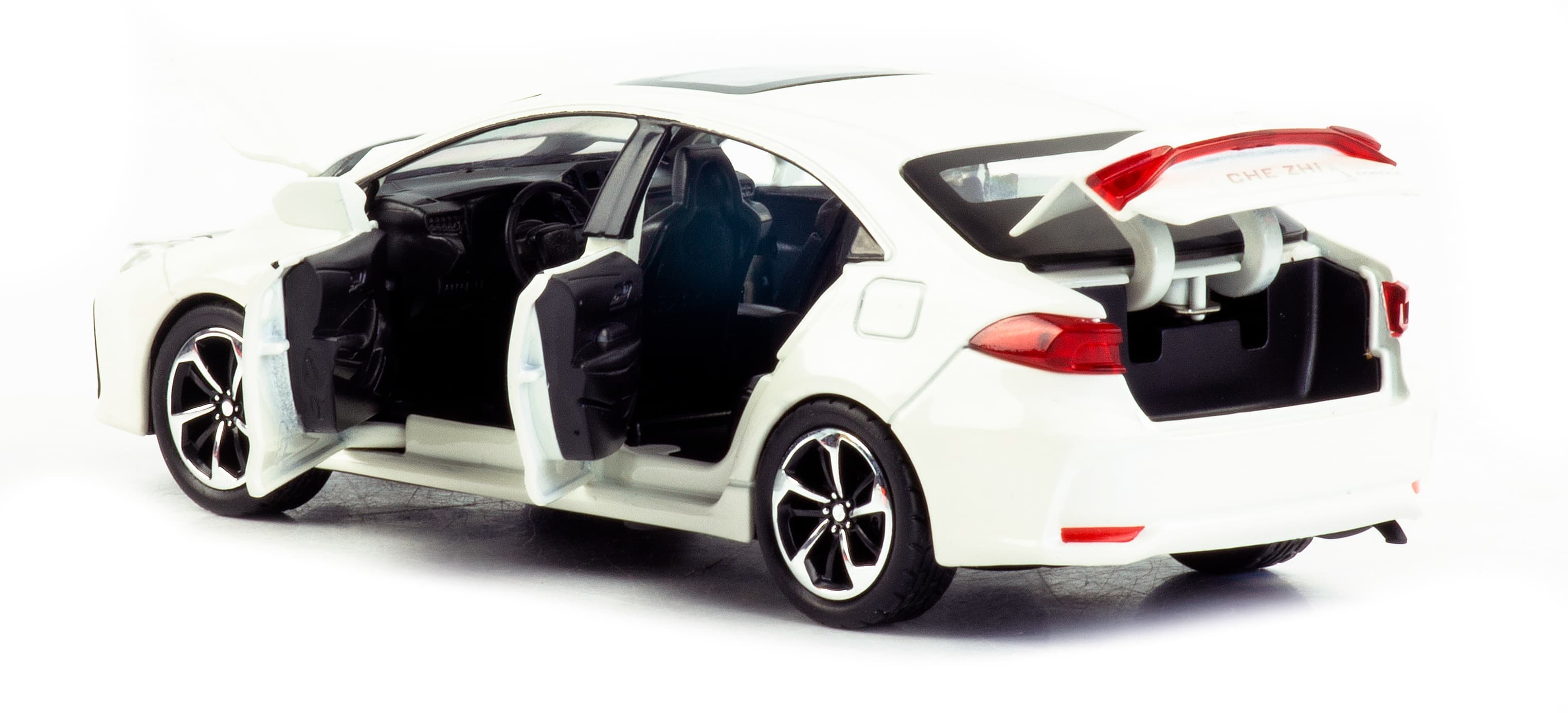 Металлическая машинка Che Zhi 1:32 «Toyota Corolla» CZ40A 15.2 см. инерционная, свет, звук / Белый