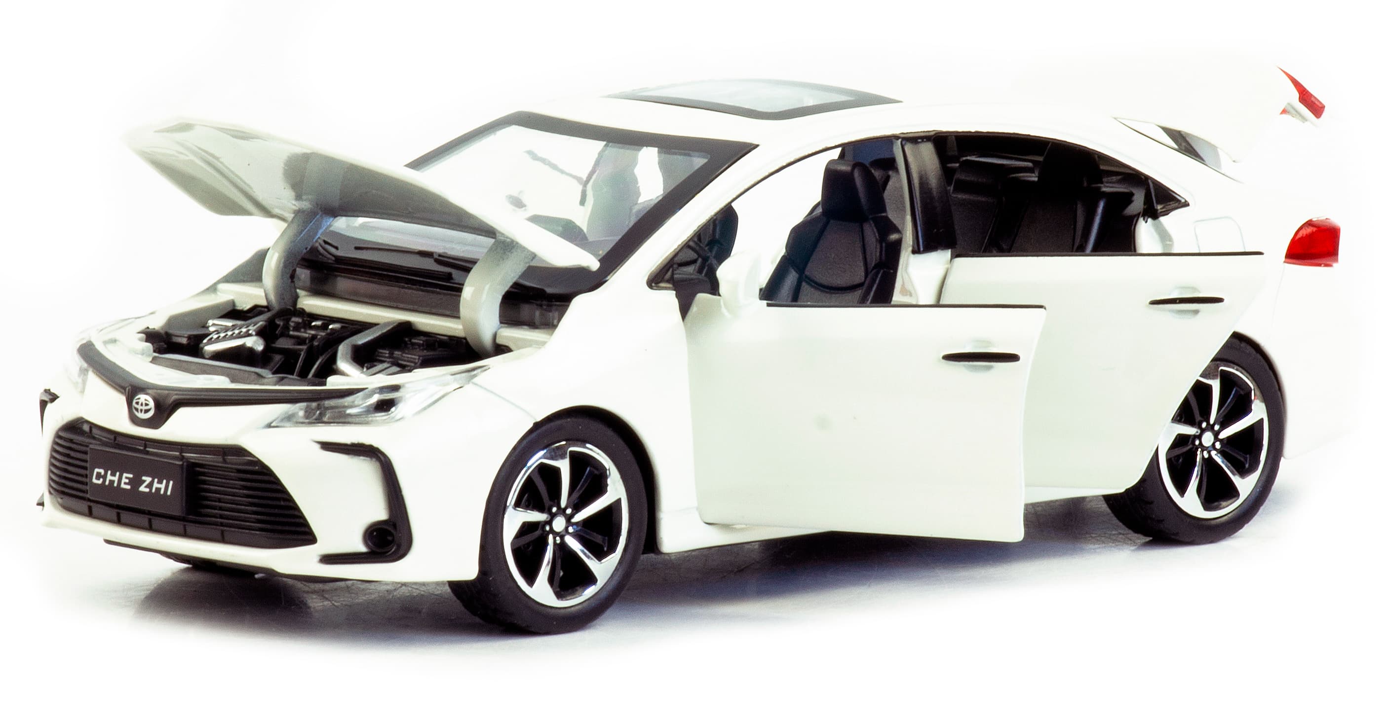 Металлическая машинка Che Zhi 1:32 «Toyota Corolla» CZ40A 15.2 см. инерционная, свет, звук / Белый