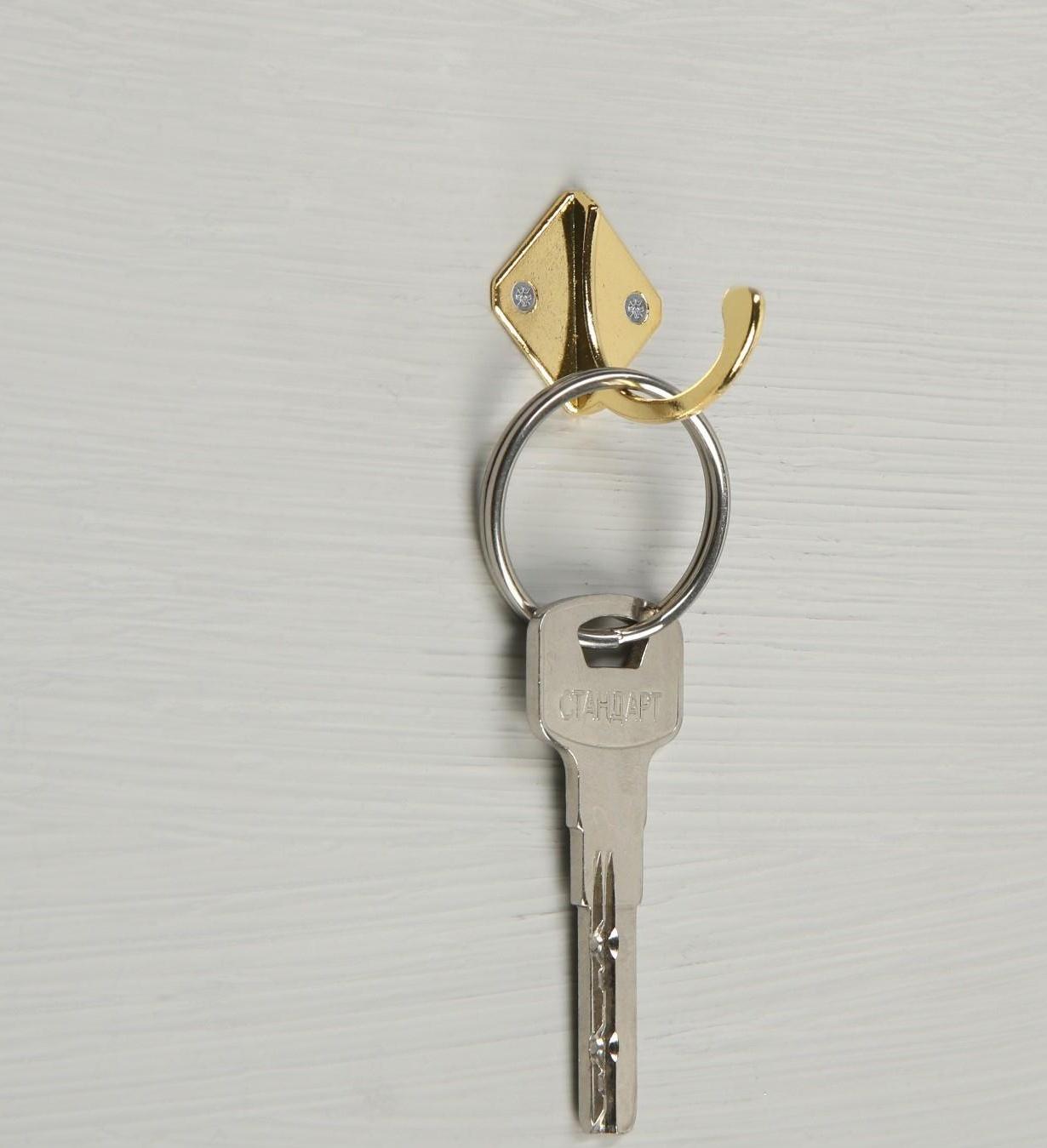 Крючок мебельный KM1001GP, однорожковый, цвет золото