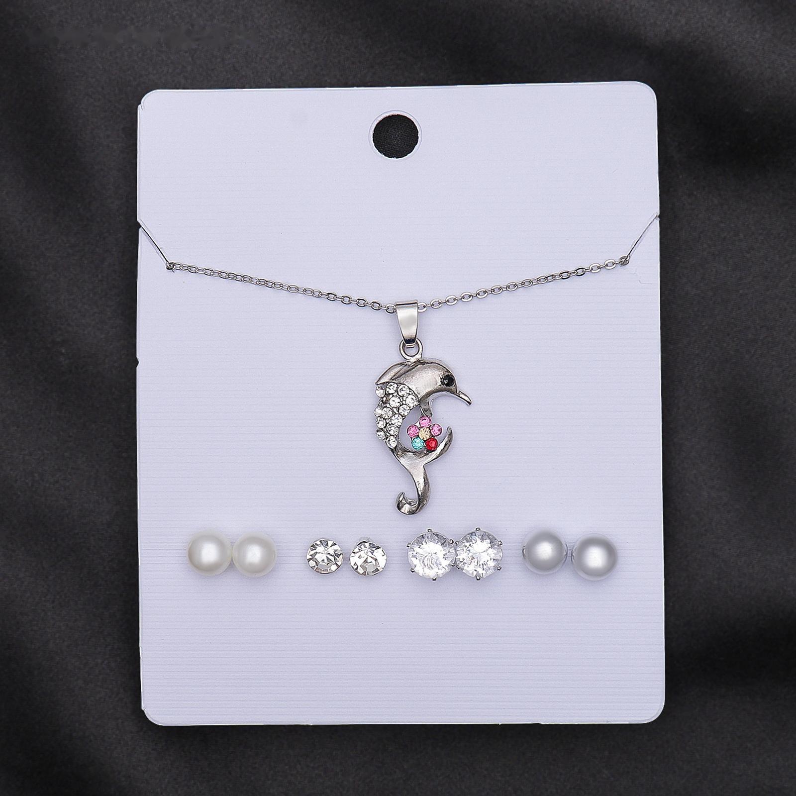 Гарнитур 5 предметов: 4 пары пуссет, кулон 