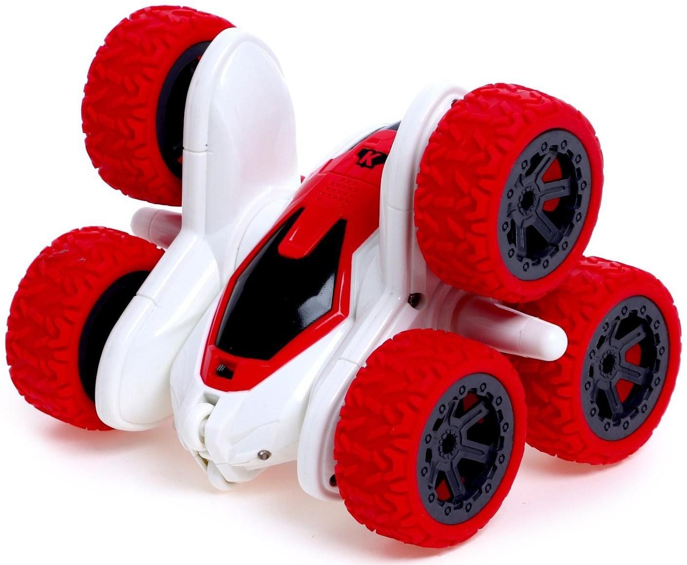 Машинка - перевертыш «Экстримал», пульт в виде часов, работает от аккумулятора, цвет красный