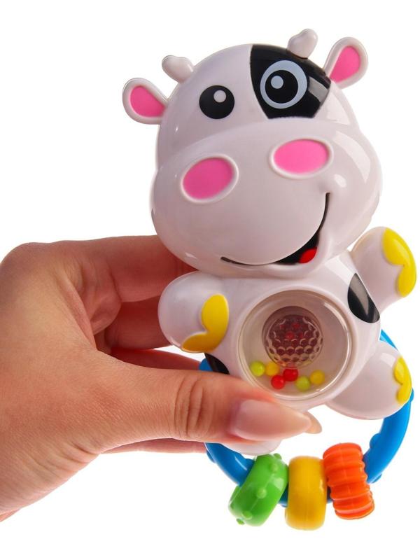 Погремушка со световым эффектом «Коровка»