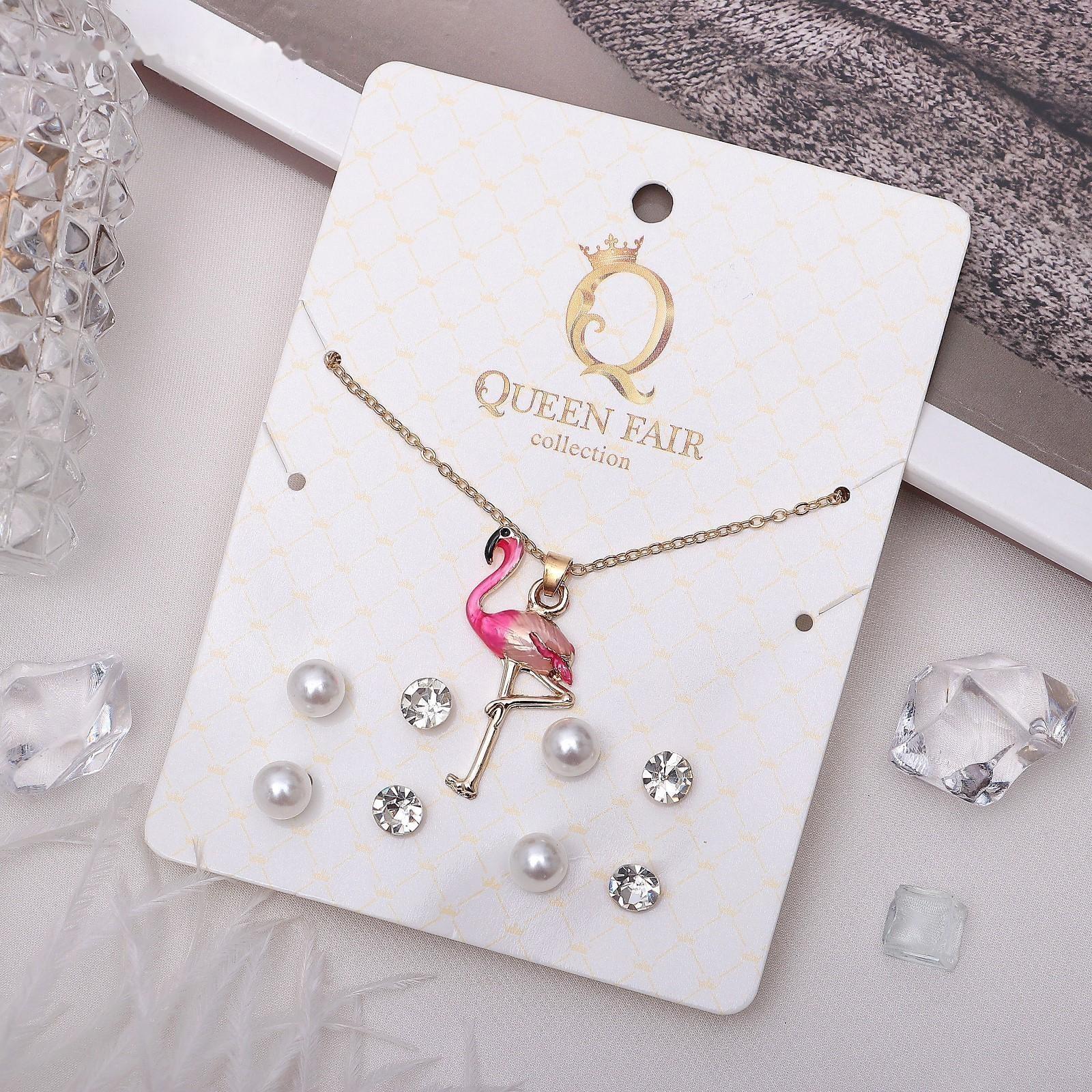 Гарнитур 5 предметов: 4 пары пуссет,кулон 