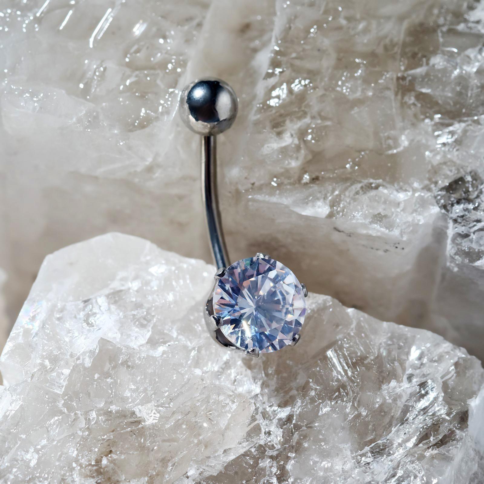 Пирсинг в пупок 