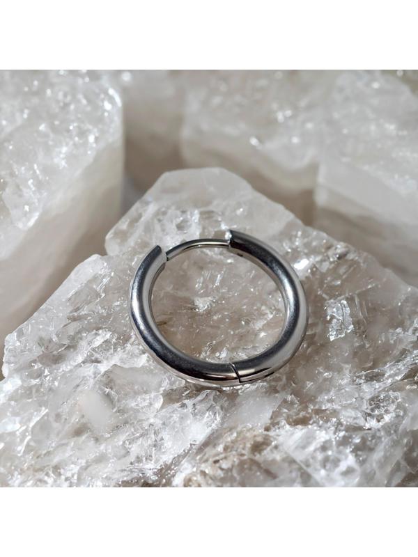 Пирсинг в ухо 