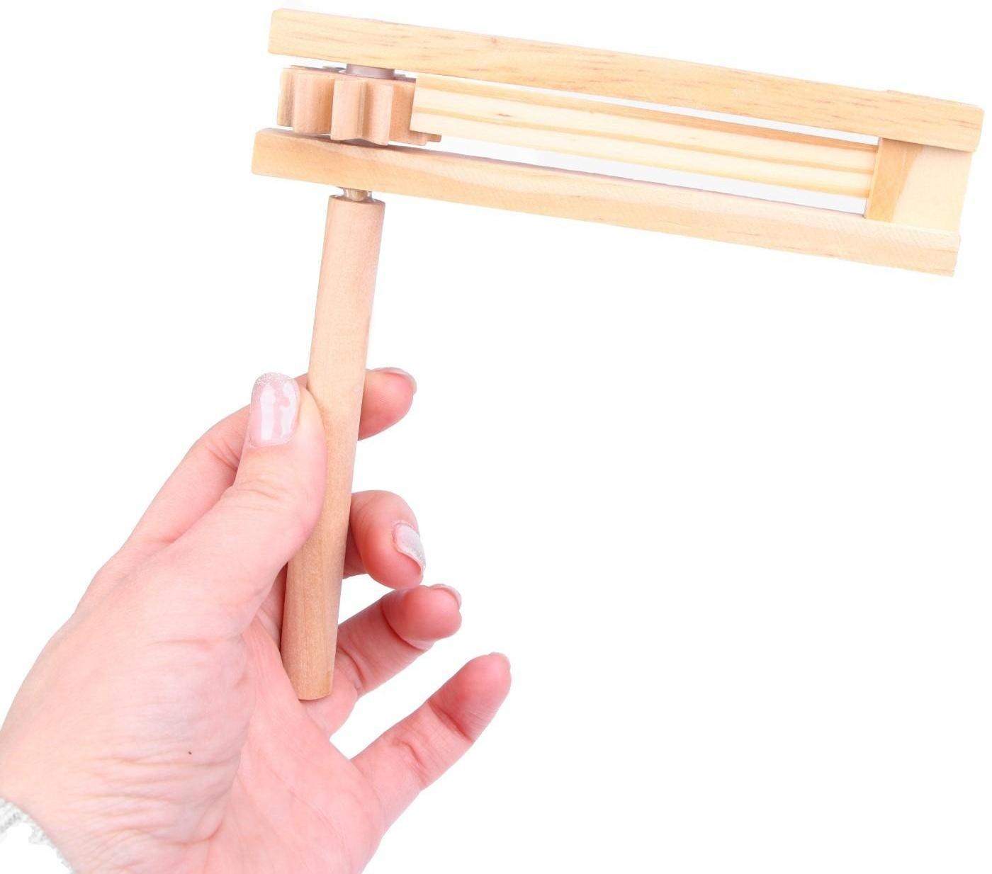 Музыкальная игрушка «Трещотка» 14,5 × 15 × 3 см