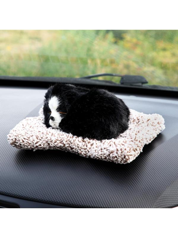 Игрушка на панель авто, собака на подушке, черный окрас