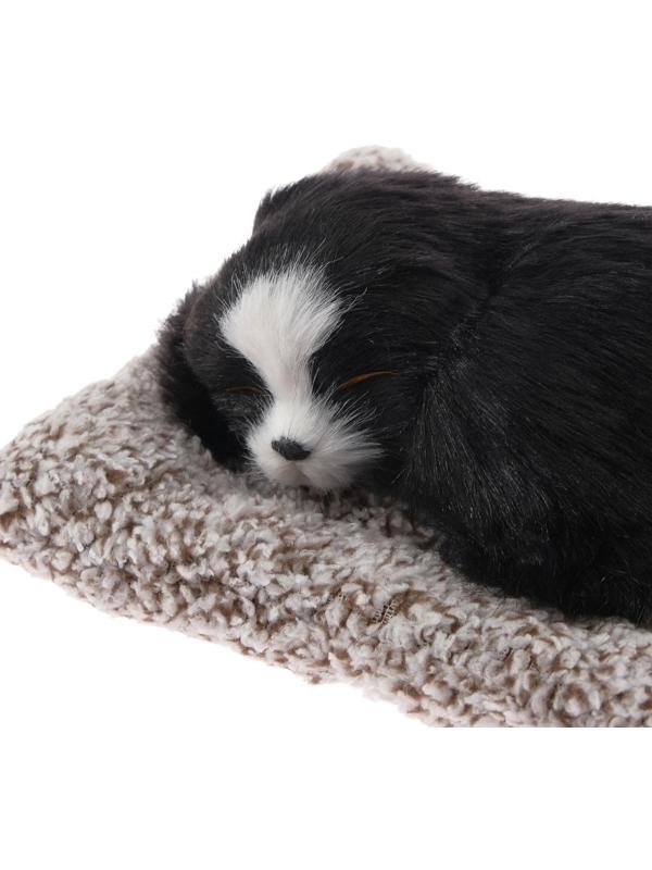 Игрушка на панель авто, собака на подушке, черный окрас