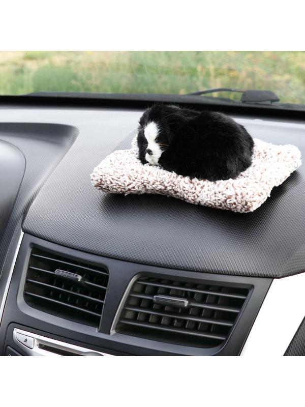 Игрушка на панель авто, собака на подушке, черный окрас