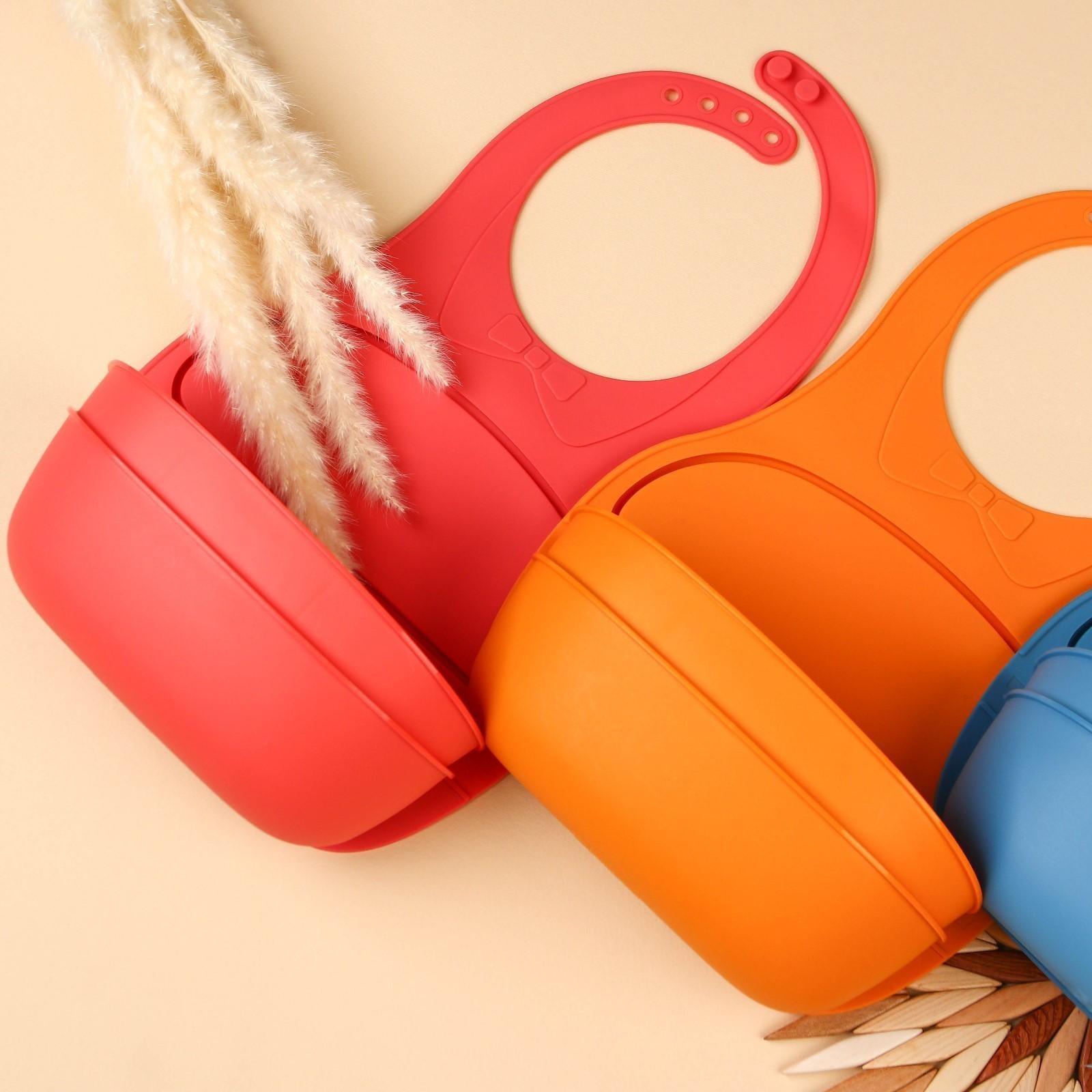 Нагрудник для кормления пластиковый с карманом-контейнером, цвет розовый