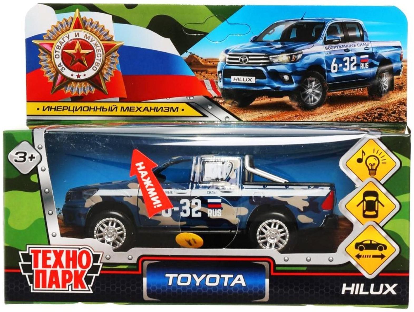 Машина металлическая Toyota Hilux, 12 см, световые и звуковые эффекты, двери, цвет синий камуфляж