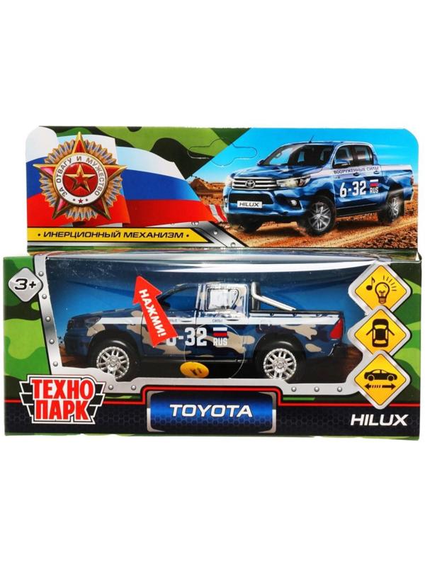 Машина металлическая Toyota Hilux, 12 см, световые и звуковые эффекты, двери, цвет синий камуфляж